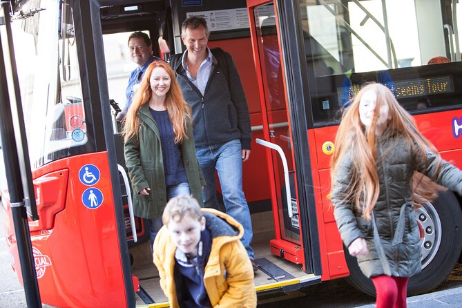 City Sightseeing Edinburgh Hop-On Hop-Off Bus Tour + Kids Go Free - Audio commentary: great for orientation, mixed for deep history