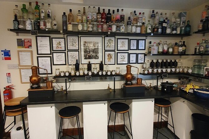 Distill a bottle of Gin on mini copper stills - While your gin runs: cocktail time, then tasting and the final bottling ritual