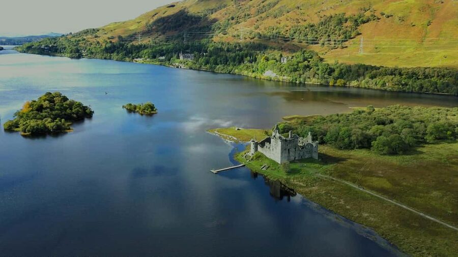 Edinburgh: Oban, Kilchurn Castle & Inveraray Tour in Spanish - Into the Trossachs and toward Loch Awe, where history rides shotgun