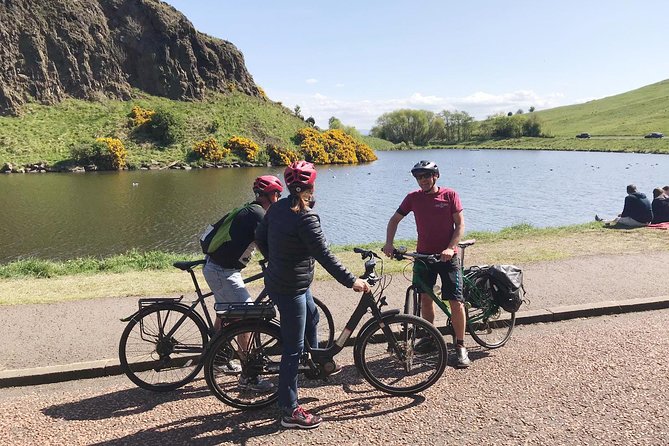 Edinburgh Sky to Sea Bike or E-Bike Tour with Transfer by TBC - Holyrood Palace and the Scottish Parliament from bike level