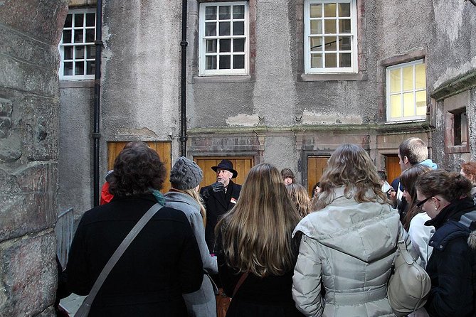 Royal Mile and Edinburgh Castle - Small Group Walking Tour - Parliament House View Stops That Actually Help You Navigate